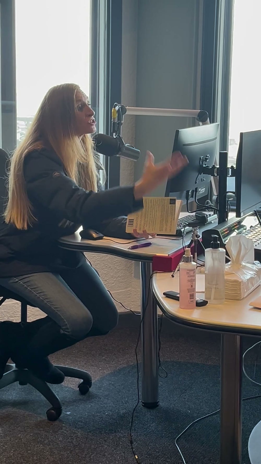 Amanda Perry at the CCFM studio desk, mid-interview