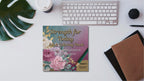 strength for today adult coloring book cover on a modern desk background