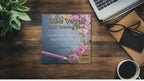 Bible versus coloring book for adults with floral background on top right of cover, darker blue background than the verses book